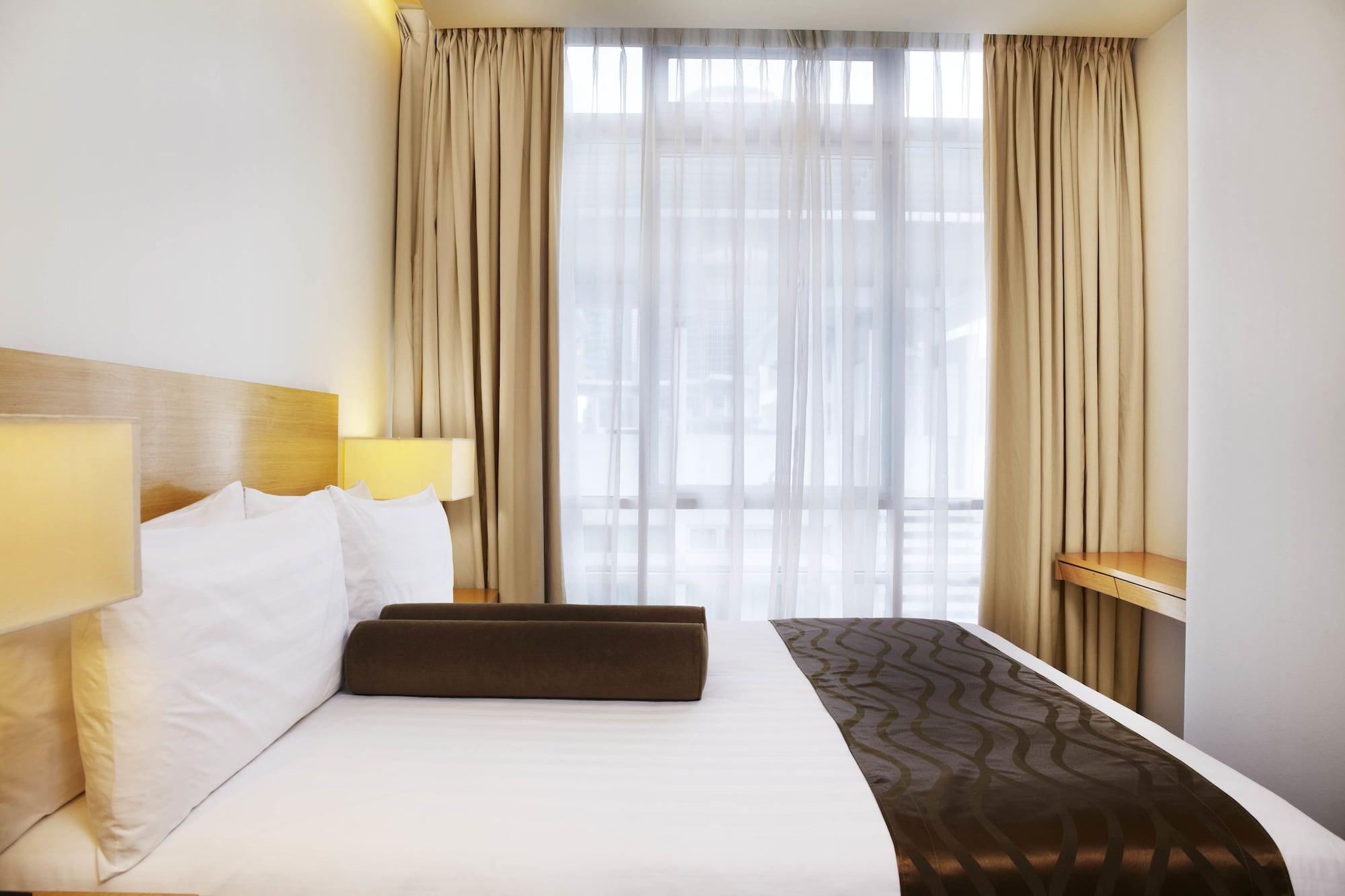 Parkroyal Serviced Suites קואלה לומפור מראה חיצוני תמונה A bedroom at the hotel