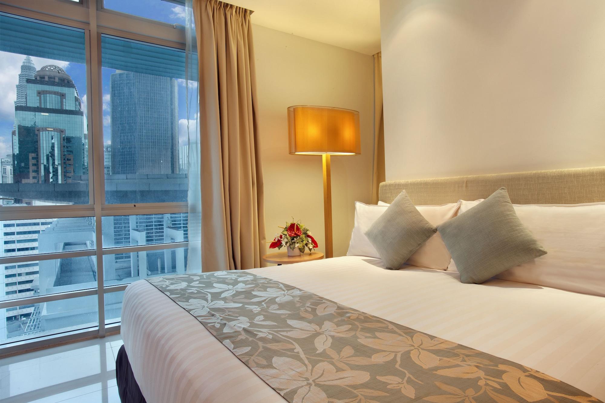 Parkroyal Serviced Suites קואלה לומפור חדר תמונה A bedroom at the hotel