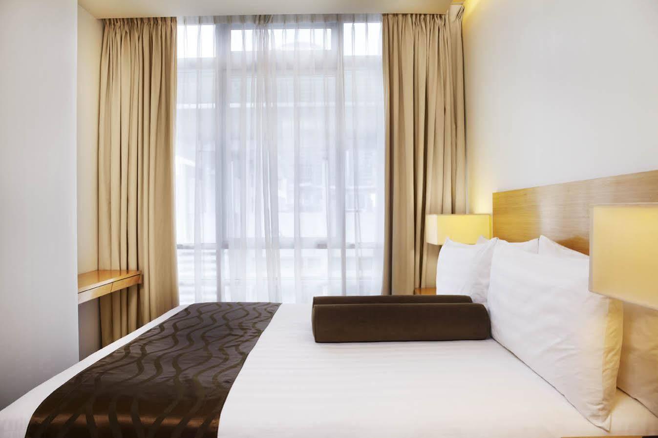 Parkroyal Serviced Suites קואלה לומפור מראה חיצוני תמונה A bedroom at the hotel